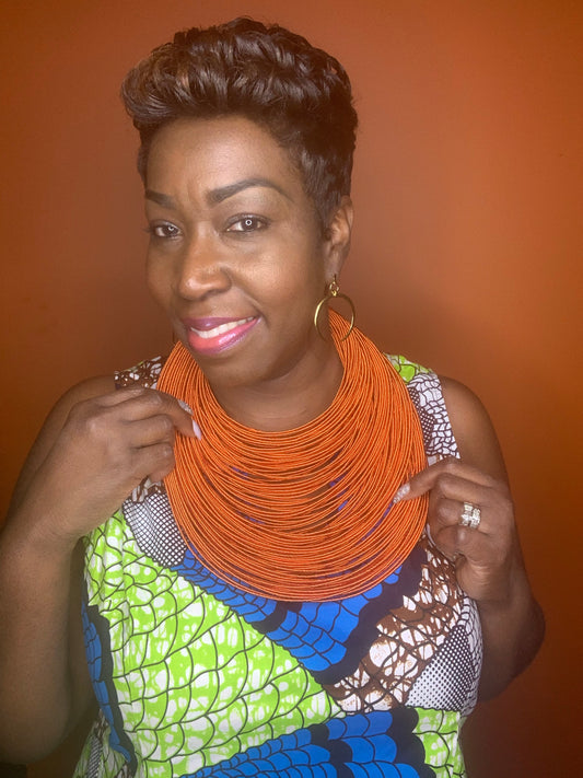 Aziza Tribal Bib (Orange)