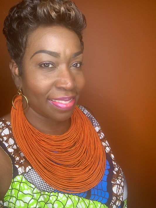 Aziza Tribal Bib (Orange)